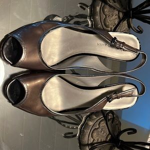 Dress heels, pewter patent all leather. Open toe and heel.